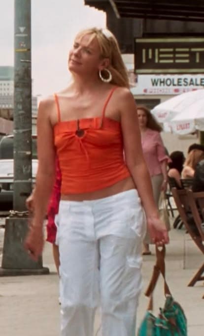 Samantha Jones Orange Top & White Cargo Pants Look